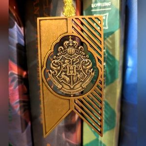 Spinning Hogwarts crest Christmas Ornament